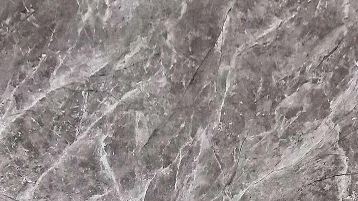 Detalhe da superfície Grigio Tricolore